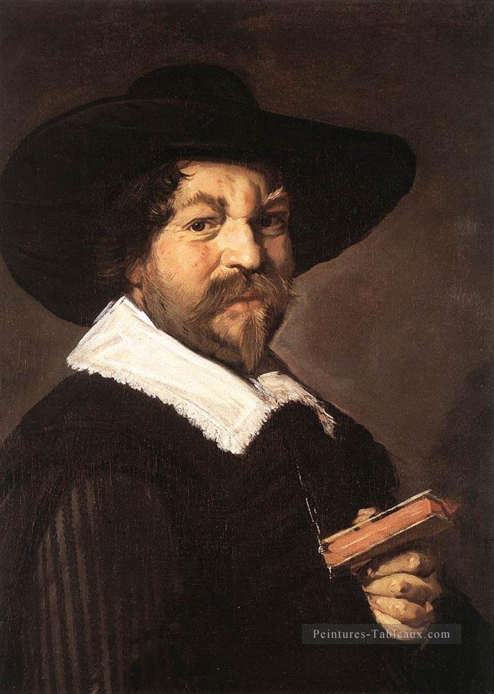 Portrait d’un homme tenant un livre Siècle d’or néerlandais Frans Hals Peintures à l'huile